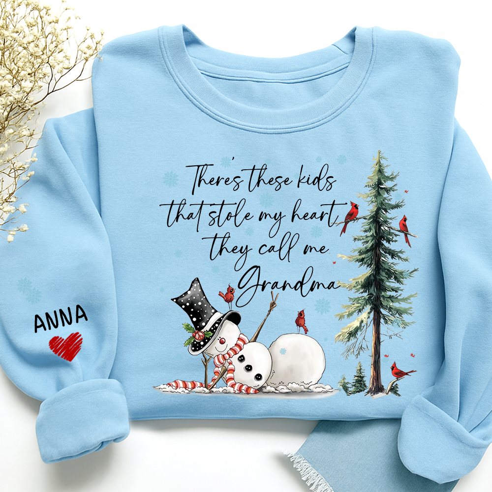 There’s These Kids That Stole My Heart They Call Me Grandma Sweatshirt, Personalized Christmas Shirt For Grandma And Kids