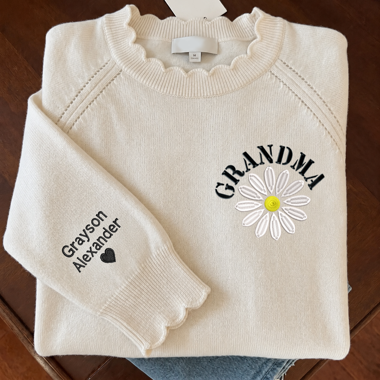 Custom Grandma Knit Sweater β Embroidered Daisy Pattern, Personalized Sleeve Text, Cozy Gift for Nana