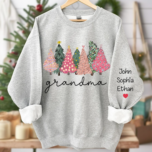 Grandma Christmas trees lights snow pink green cozy winter And Grandkids Names Sweatshirt