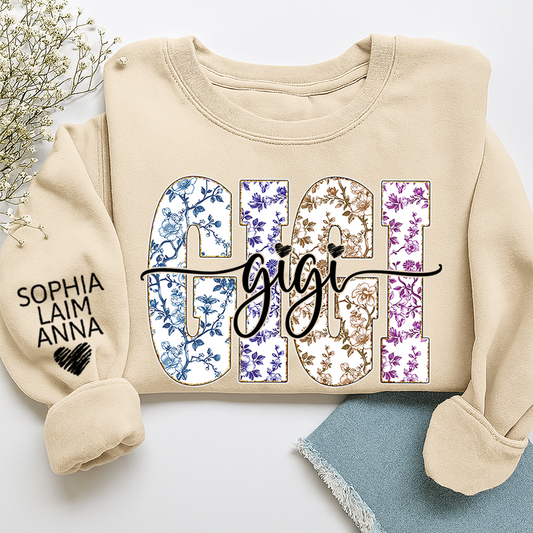 Personalized Gigi Floral Sweatshirt – Custom Multicolor Vintage Letters with Grandkids’ Names on Sleeve, Gift for Grandma