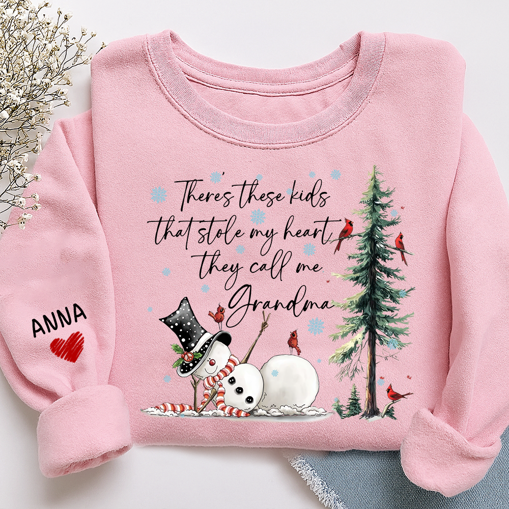 There’s These Kids That Stole My Heart They Call Me Grandma Sweatshirt, Personalized Christmas Shirt For Grandma And Kids