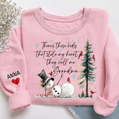 There’s These Kids That Stole My Heart They Call Me Grandma Sweatshirt, Personalized Christmas Shirt For Grandma And Kids