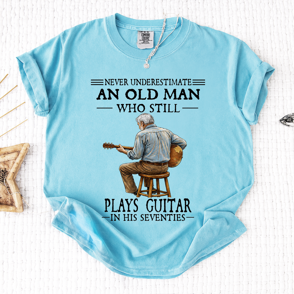 Comfort Colors Never Underestimate An Old Man Who Still Plays Guitar T-Shirt – Custom Guitar Lover Shirt for Men in Their Seventies