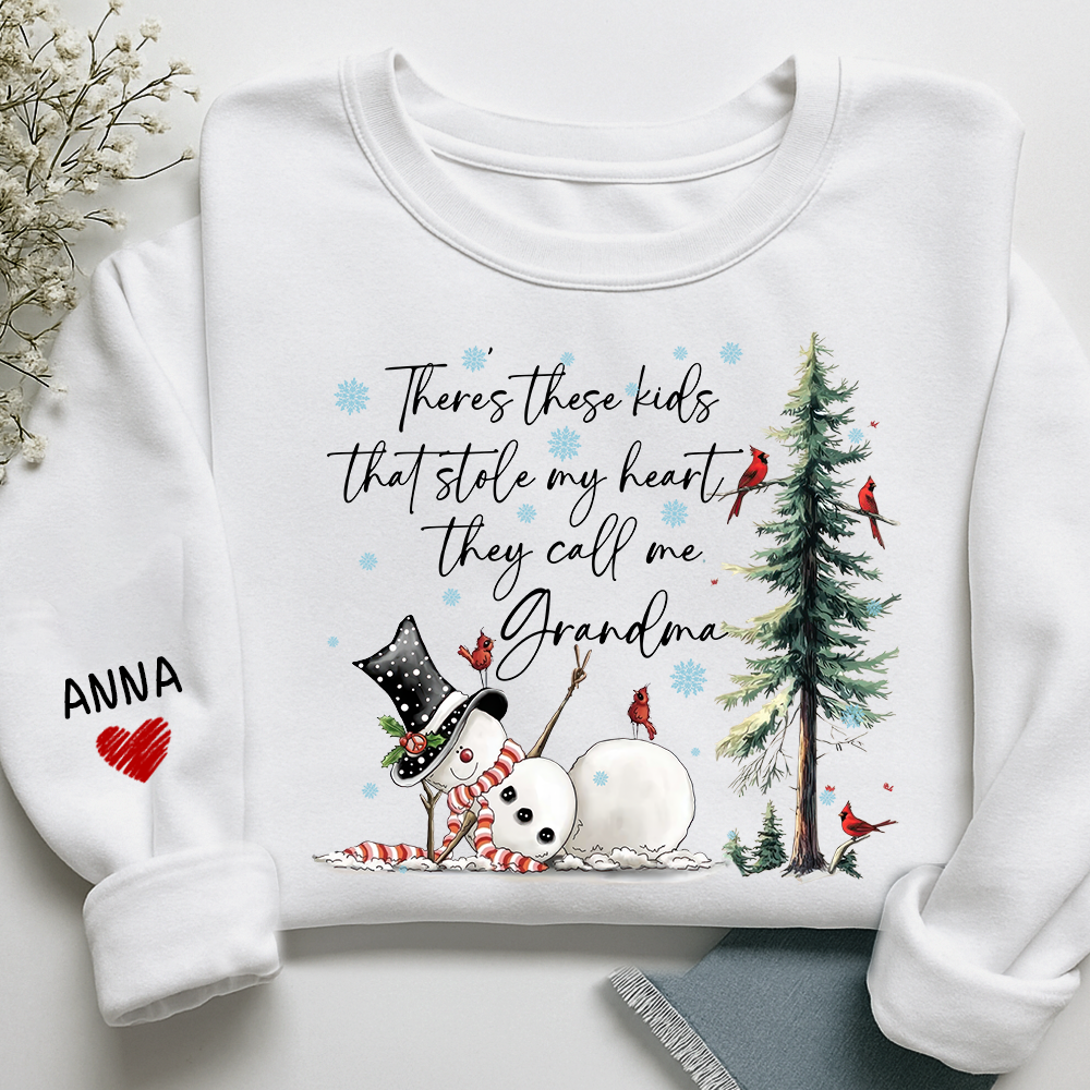 There’s These Kids That Stole My Heart They Call Me Grandma Sweatshirt, Personalized Christmas Shirt For Grandma And Kids
