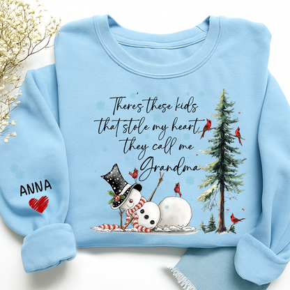 There’s These Kids That Stole My Heart They Call Me Grandma Sweatshirt, Personalized Christmas Shirt For Grandma And Kids
