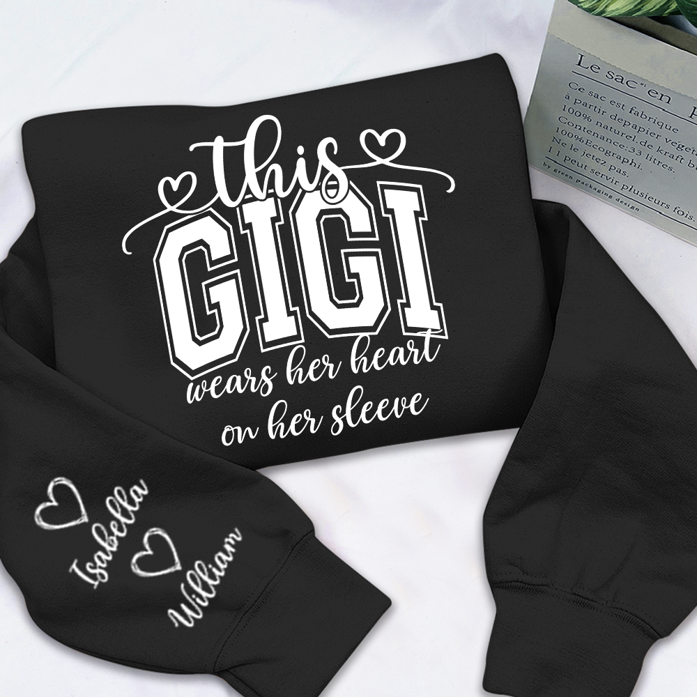 Personalized Grandma Sweatshirt - This Grandma Wears Her Heart On Her Sleeve, Custom Grandkids Names on Sleeve, Cozy Crewneck Sweater Gift for Grandma, Nana, Gigi, Mimi, Family Apparel