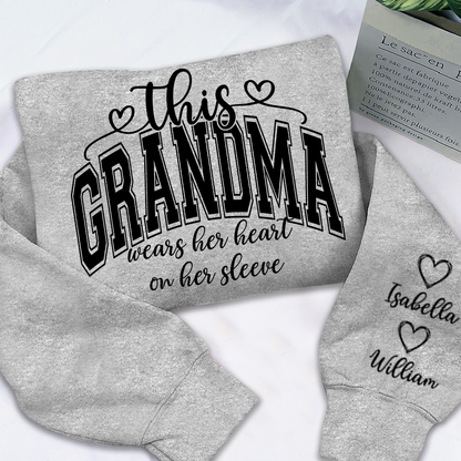 Personalized Grandma Sweatshirt, This Grandma Wears Her Heart On Her Sleeve Shirt with Grandkids’ Names, Custom Gift for Grandma Christmas