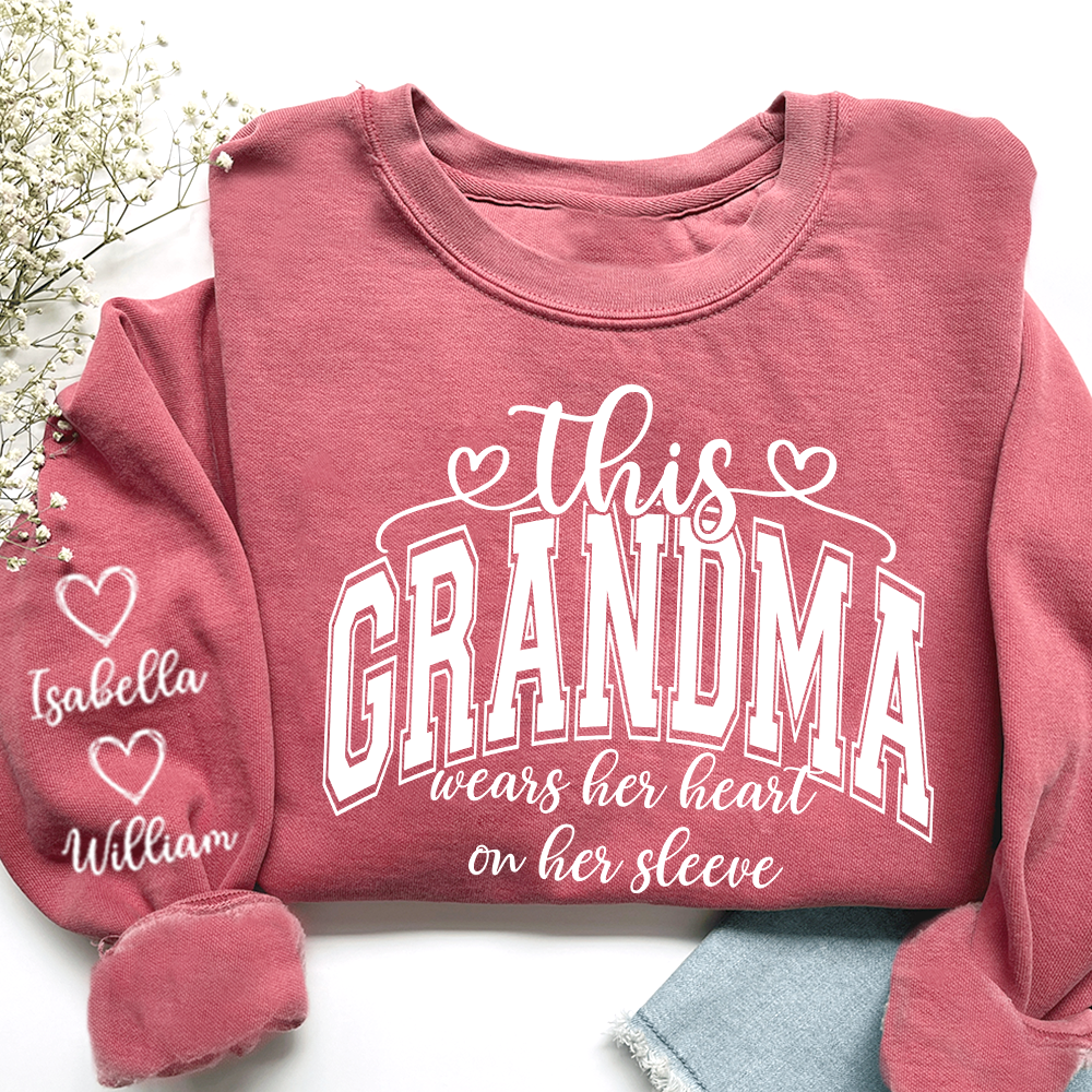 Personalized Grandma Sweatshirt, This Grandma Wears Her Heart On Her Sleeve Shirt with Grandkids’ Names, Custom Gift for Grandma Christmas