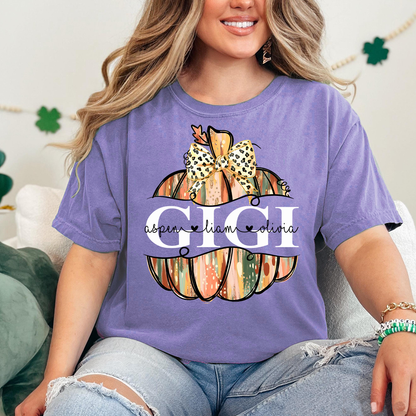 Comfort Colors® Personalized Gigi Pumpkin T-Shirt with Grandkids’ Names, Custom Fall Leopard Bow Tee for Grandma
