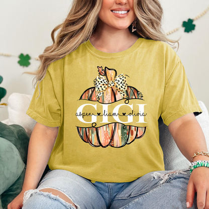 Comfort Colors® Personalized Gigi Pumpkin T-Shirt with Grandkids’ Names, Custom Fall Leopard Bow Tee for Grandma