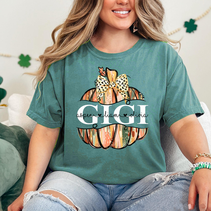 Comfort Colors® Personalized Gigi Pumpkin T-Shirt with Grandkids’ Names, Custom Fall Leopard Bow Tee for Grandma
