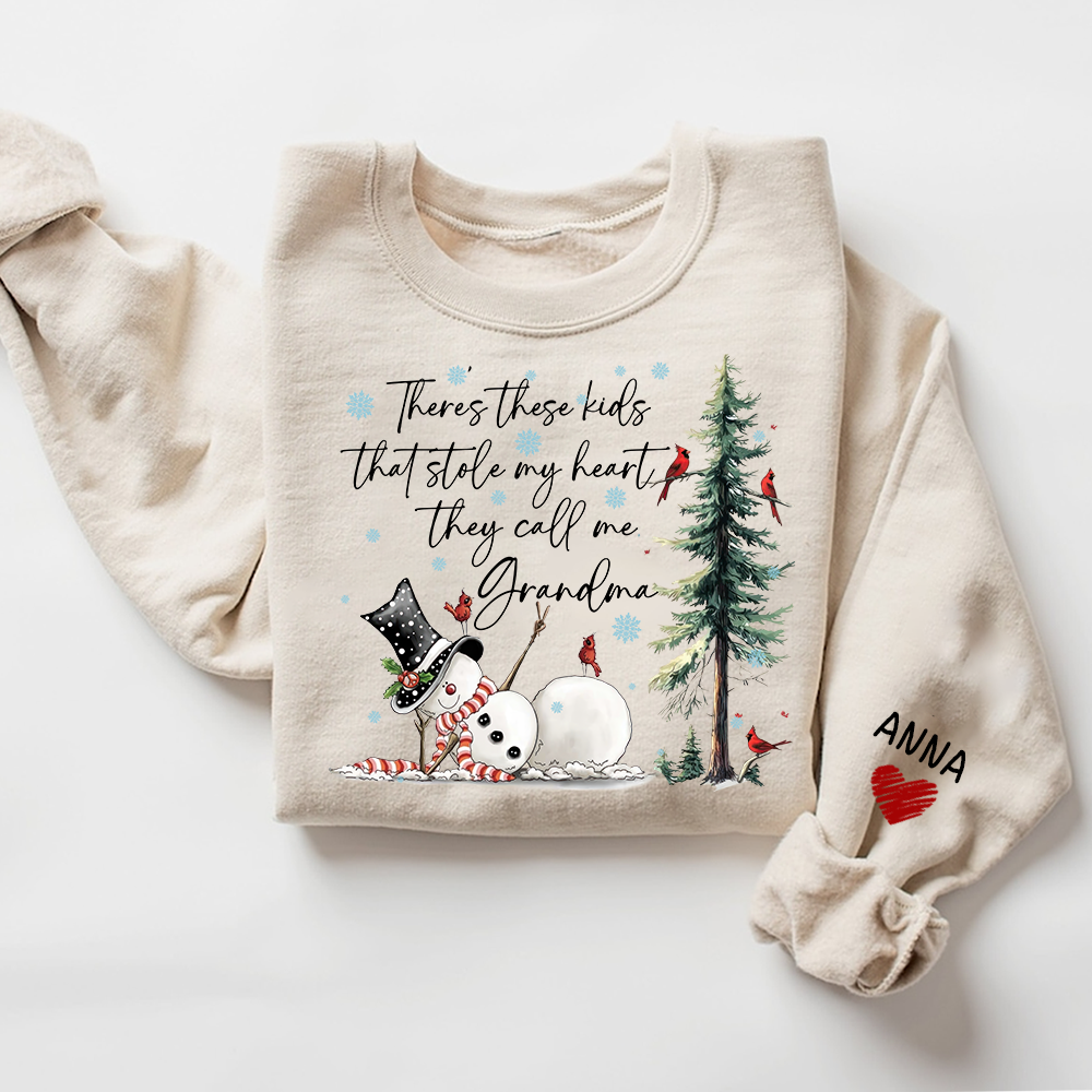 There’s These Kids That Stole My Heart They Call Me Grandma Sweatshirt, Personalized Christmas Shirt For Grandma And Kids