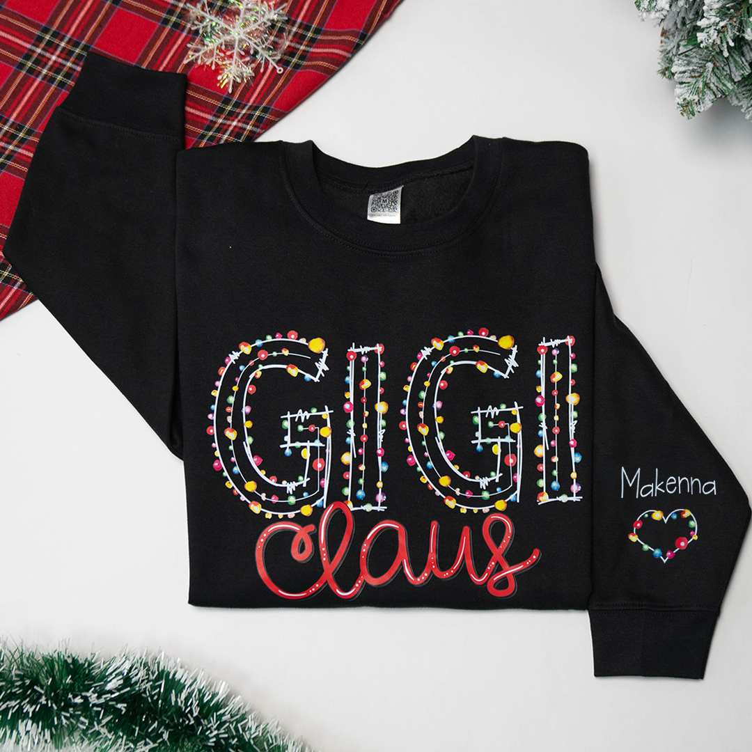 Personalized Gigi Claus Christmas lights And Grandkids Christmas Merry Sweatshirt