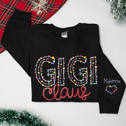 Personalized Gigi Claus Christmas lights And Grandkids Christmas Merry Sweatshirt