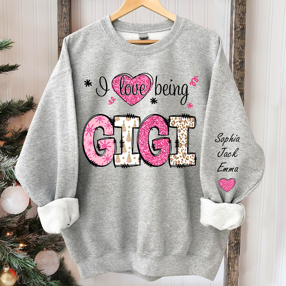 I love being Gigi Pink Christmas And Grandkids Sweatshirt
