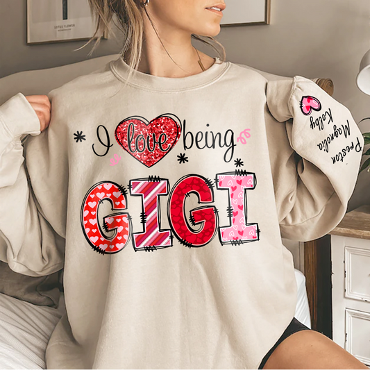 I Love Being Gigi Heart With Grandkids Names On Sleeve Sweatshirt, Personalized Mother's Day Gift