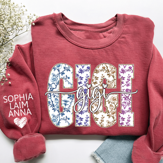 Personalized Gigi Floral Sweatshirt – Custom Multicolor Vintage Letters with Grandkids’ Names on Sleeve, Gift for Grandma
