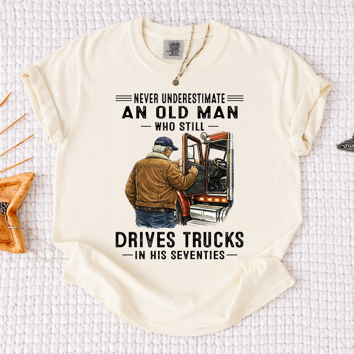 Comfort Colors Never Underestimate An Old Man Who Still Drives Trucks T-Shirt – Custom Gift for Truck Drivers in Their Seventies