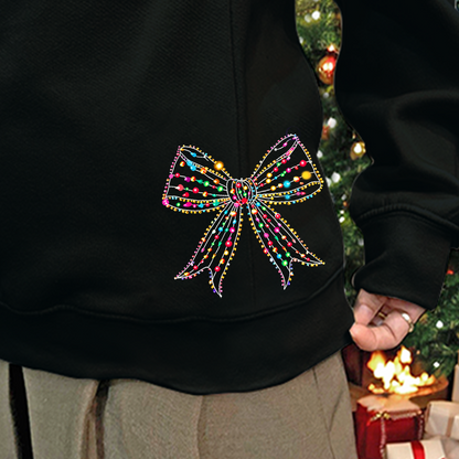 Custom Christmas Gigi Claus Light And GrandKids Name Coquette Bow Light Sweatshirt