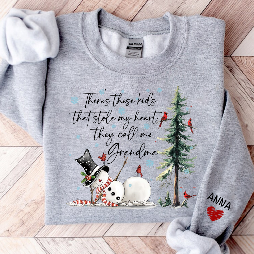 There’s These Kids That Stole My Heart They Call Me Grandma Sweatshirt, Personalized Christmas Shirt For Grandma And Kids
