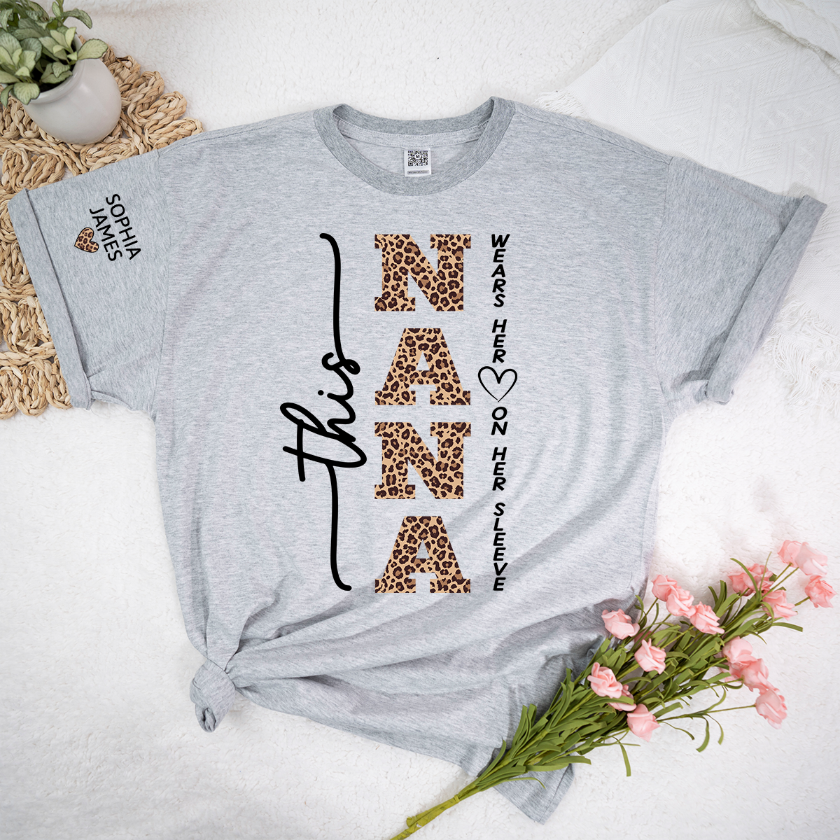 Personalized Nana Leopard Print Shirt, Custom This Nana Wears Her Heart on Her Sleeve T-Shirt with Kids Names