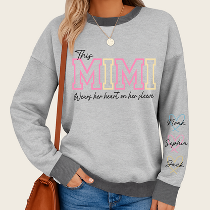 This Mimi Wears Her Heart On Her Sleeve – Personalized Sweatshirt with Grandkids’ Names, Custom Gift for Grandma, Nana & Gigi