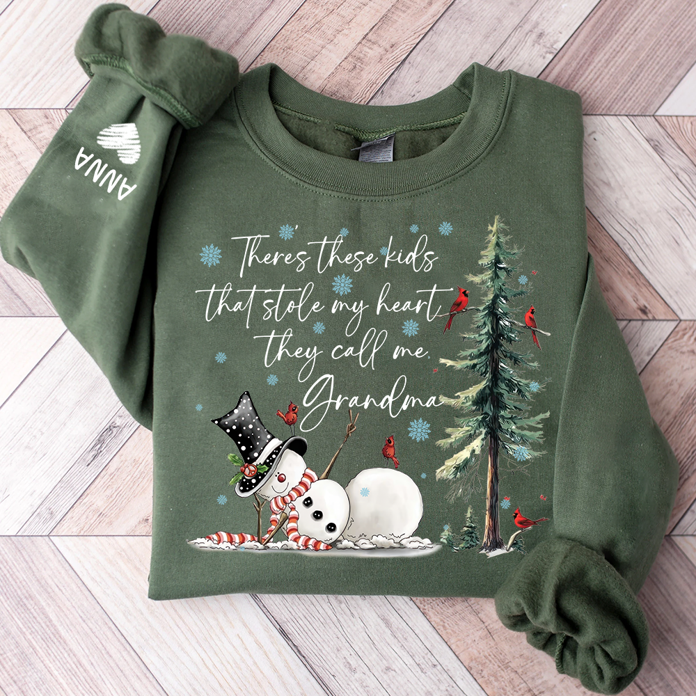 There’s These Kids That Stole My Heart They Call Me Grandma Sweatshirt, Personalized Christmas Shirt For Grandma And Kids
