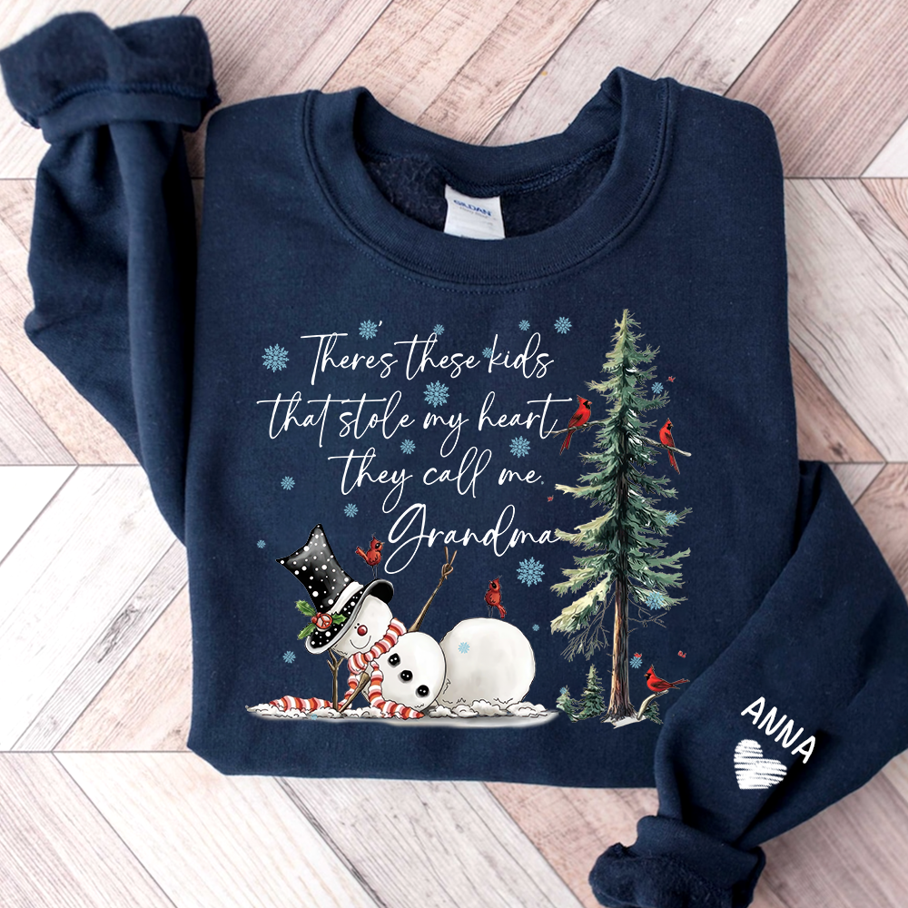There’s These Kids That Stole My Heart They Call Me Grandma Sweatshirt, Personalized Christmas Shirt For Grandma And Kids
