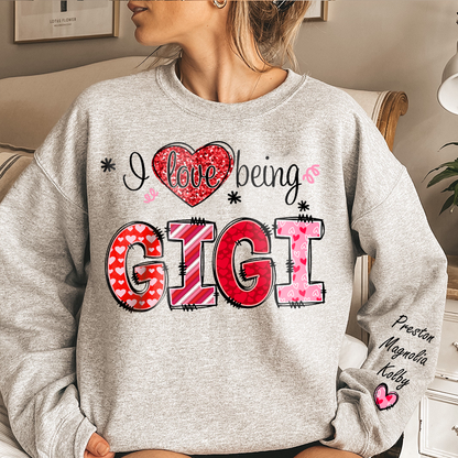 I Love Being Gigi Heart With Grandkids Names On Sleeve Sweatshirt, Personalized Mother's Day Gift