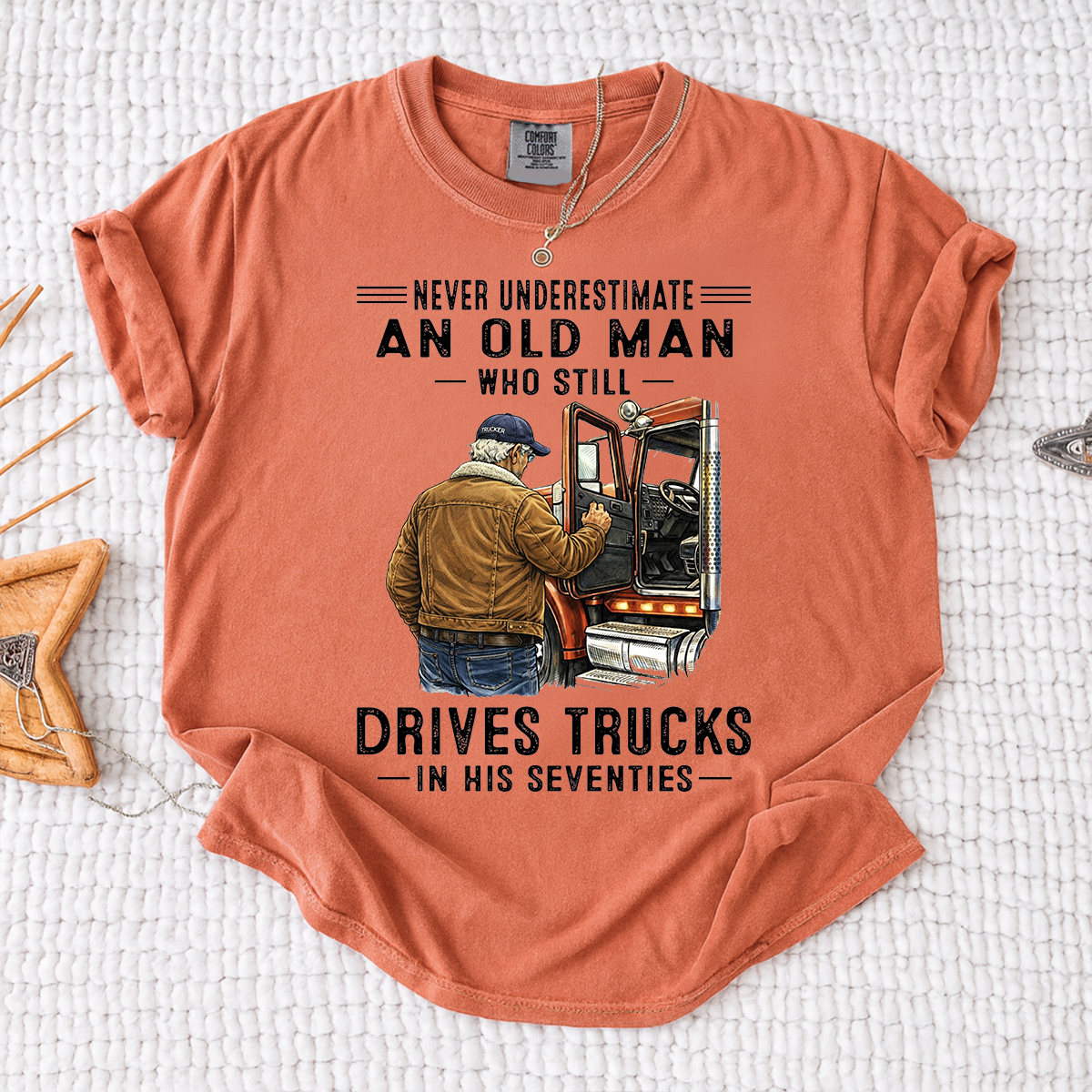 Comfort Colors Never Underestimate An Old Man Who Still Drives Trucks T-Shirt – Custom Gift for Truck Drivers in Their Seventies