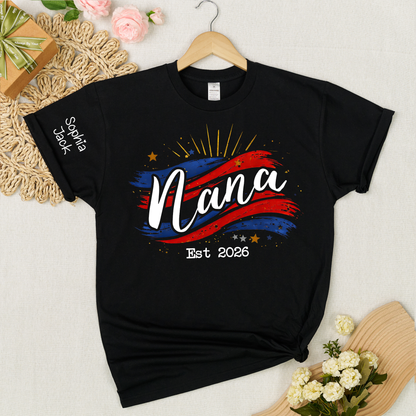 Promoted to Nana Est 2026 Shirt, Personalized Patriotic Nana T-Shirt with Grandkids Names on Sleeve, American Flag Brush Stroke Custom Grandma Tee