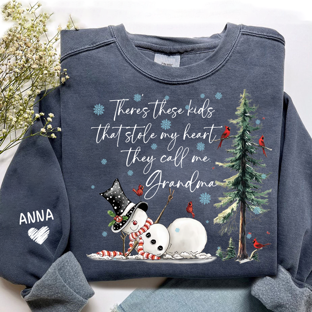 There’s These Kids That Stole My Heart They Call Me Grandma Sweatshirt, Personalized Christmas Shirt For Grandma And Kids