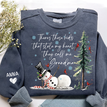 There’s These Kids That Stole My Heart They Call Me Grandma Sweatshirt, Personalized Christmas Shirt For Grandma And Kids