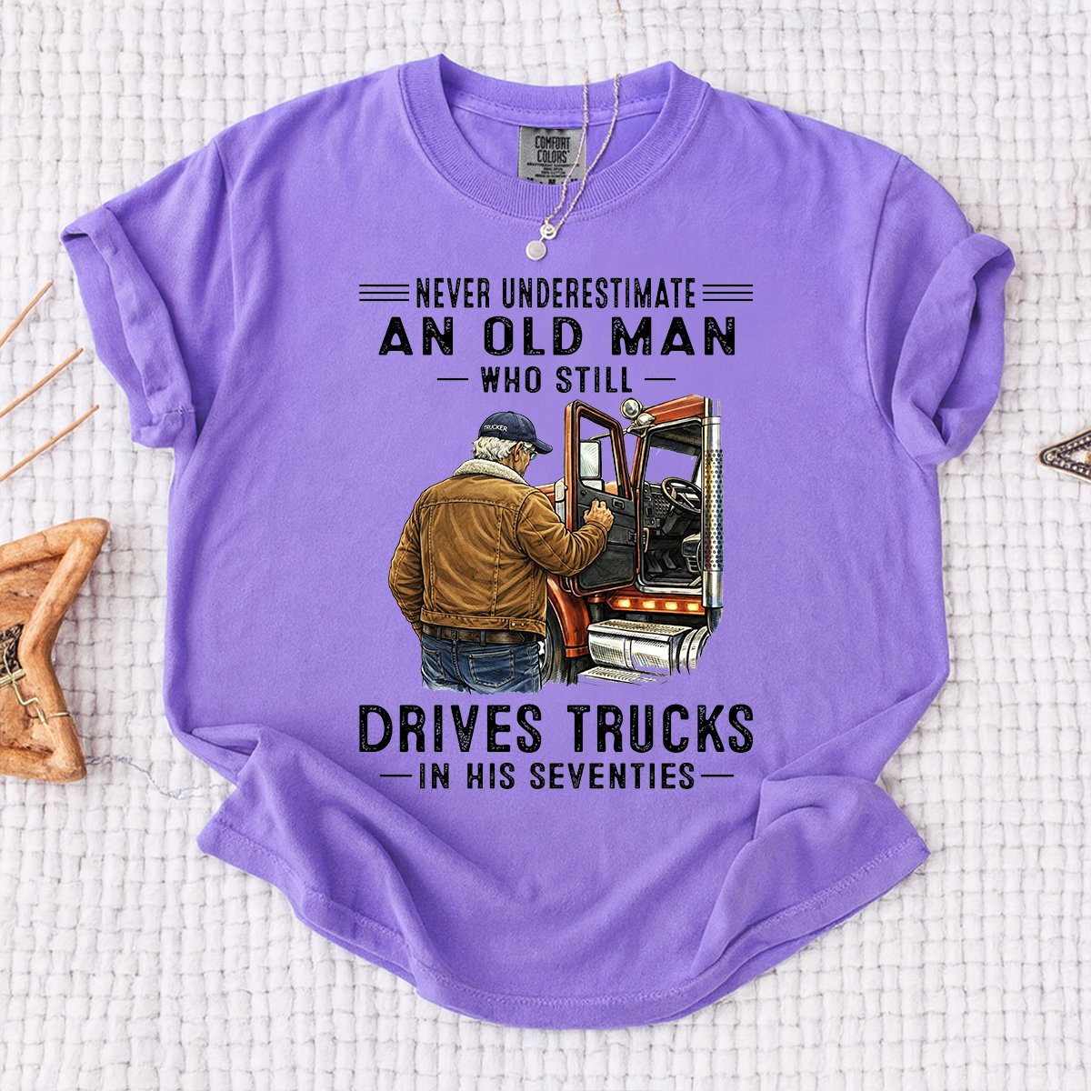 Comfort Colors Never Underestimate An Old Man Who Still Drives Trucks T-Shirt – Custom Gift for Truck Drivers in Their Seventies