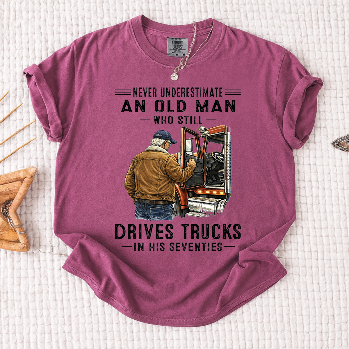 Comfort Colors Never Underestimate An Old Man Who Still Drives Trucks T-Shirt – Custom Gift for Truck Drivers in Their Seventies