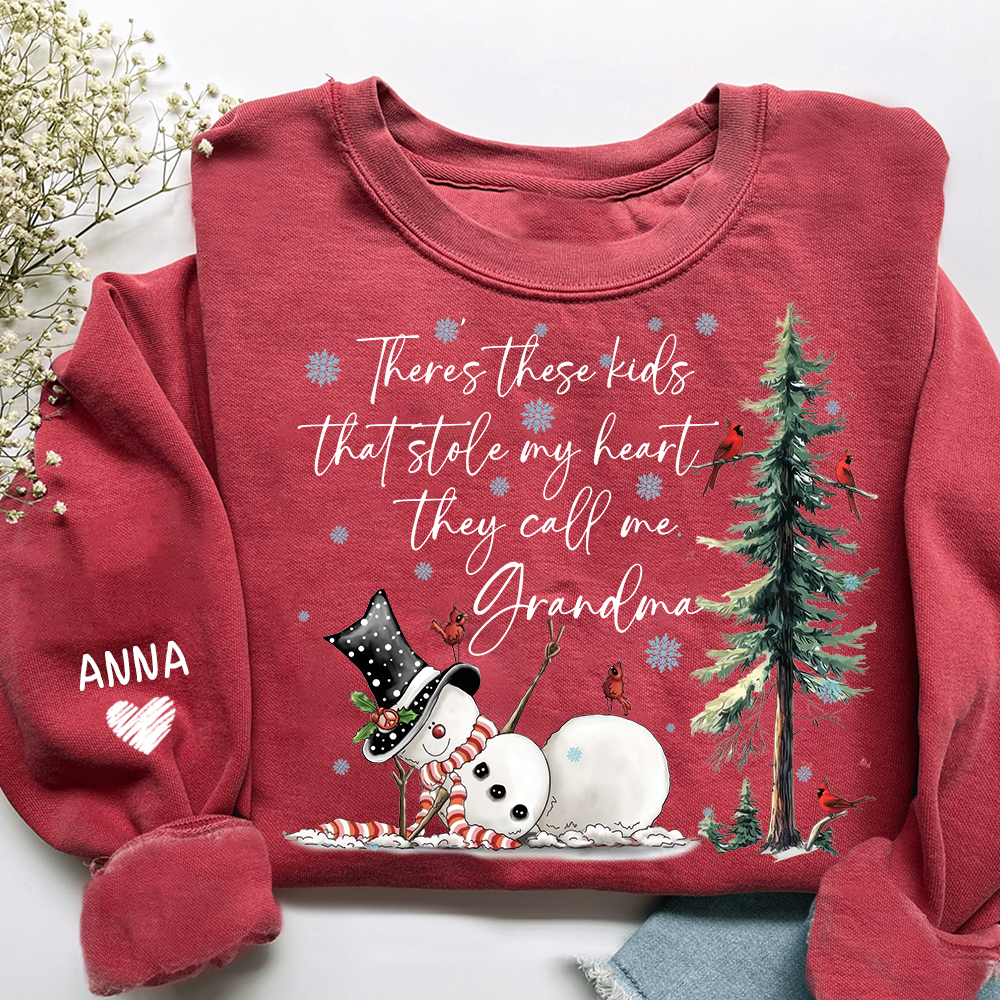 There’s These Kids That Stole My Heart They Call Me Grandma Sweatshirt, Personalized Christmas Shirt For Grandma And Kids