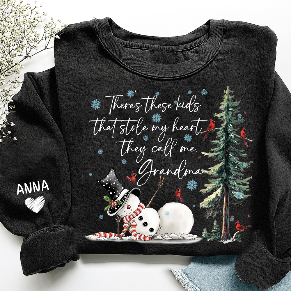 There’s These Kids That Stole My Heart They Call Me Grandma Sweatshirt, Personalized Christmas Shirt For Grandma And Kids