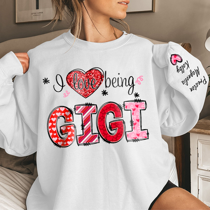 I Love Being Gigi Heart With Grandkids Names On Sleeve Sweatshirt, Personalized Mother's Day Gift