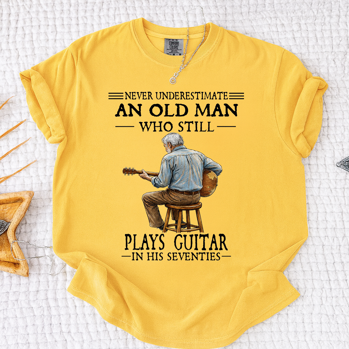 Comfort Colors Never Underestimate An Old Man Who Still Plays Guitar T-Shirt – Custom Guitar Lover Shirt for Men in Their Seventies