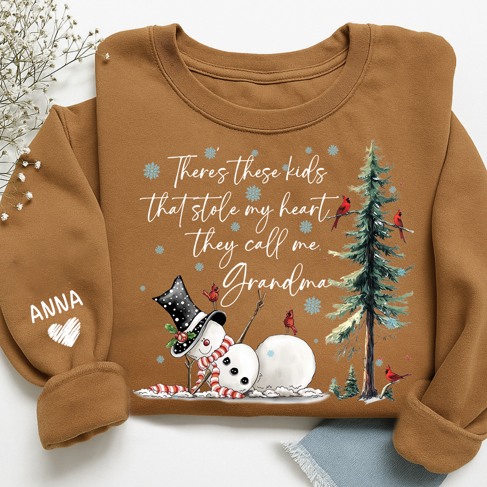 There’s These Kids That Stole My Heart They Call Me Grandma Sweatshirt, Personalized Christmas Shirt For Grandma And Kids
