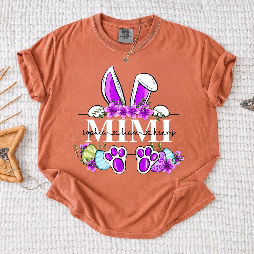 Comfort Colors Personalized Easter Bunny T-shirt | Custom Name Design for Mimi, Grandma, & Mom | Floral Easter Shirt with Bunny Ears and Paw Prints