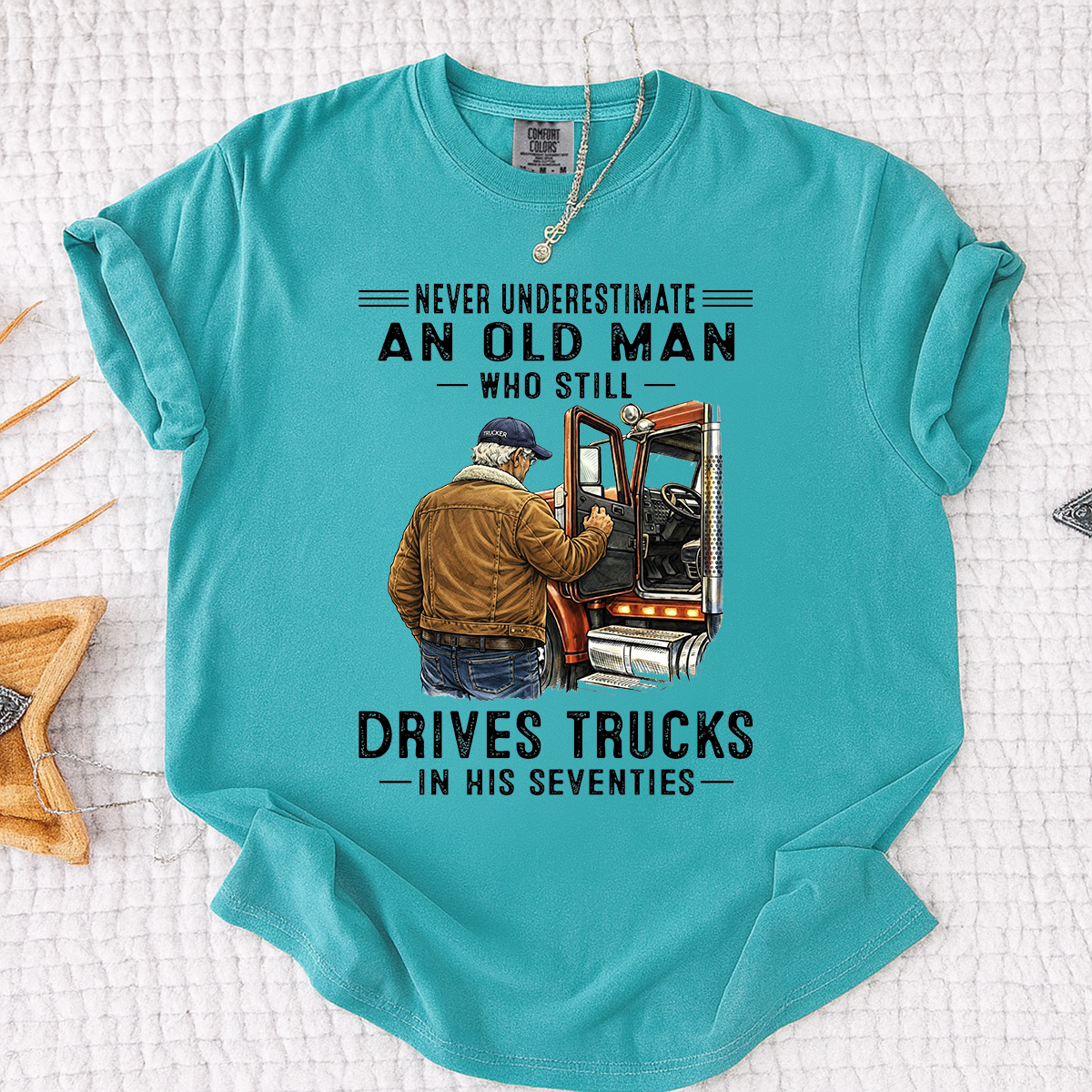 Comfort Colors Never Underestimate An Old Man Who Still Drives Trucks T-Shirt – Custom Gift for Truck Drivers in Their Seventies