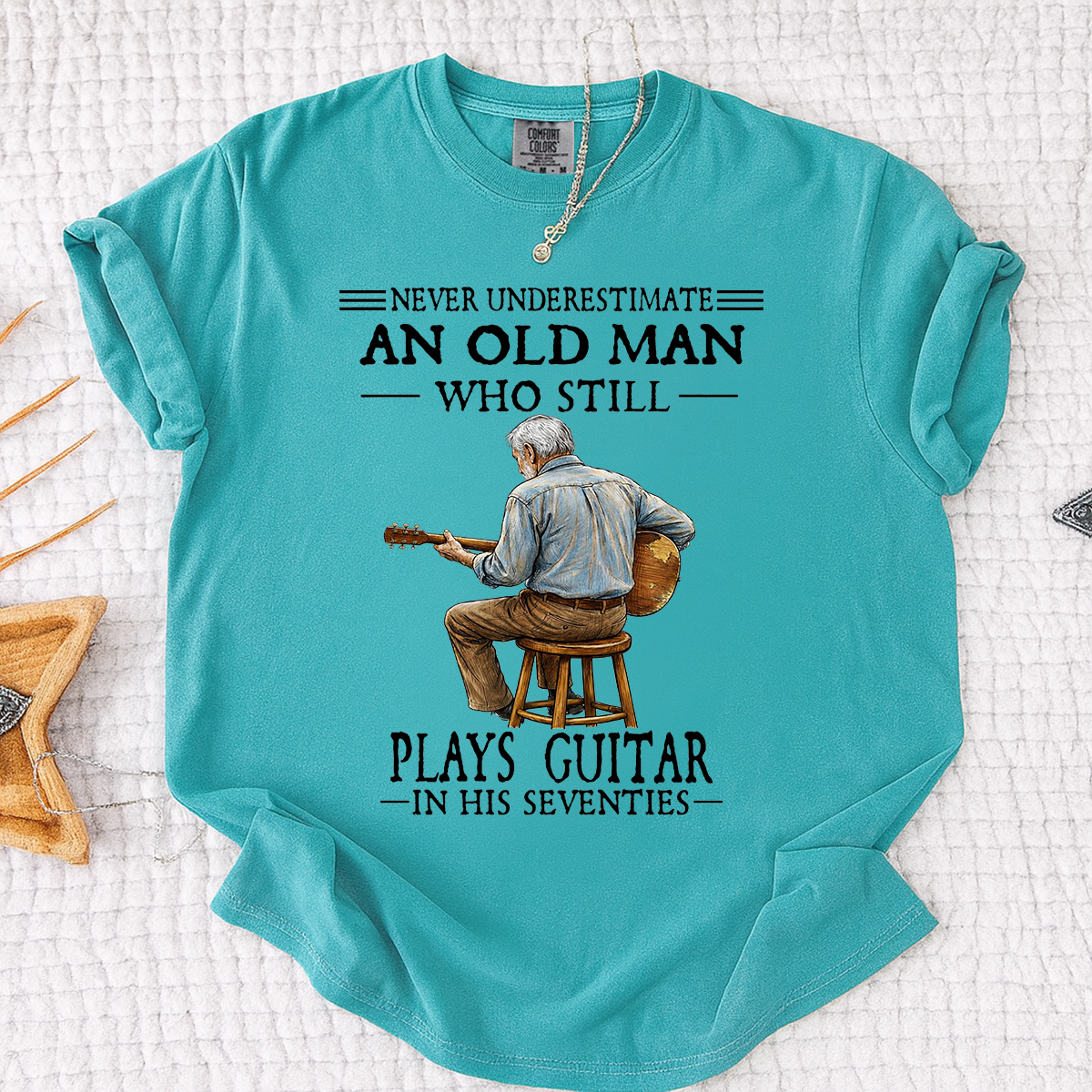 Comfort Colors Never Underestimate An Old Man Who Still Plays Guitar T-Shirt – Custom Guitar Lover Shirt for Men in Their Seventies