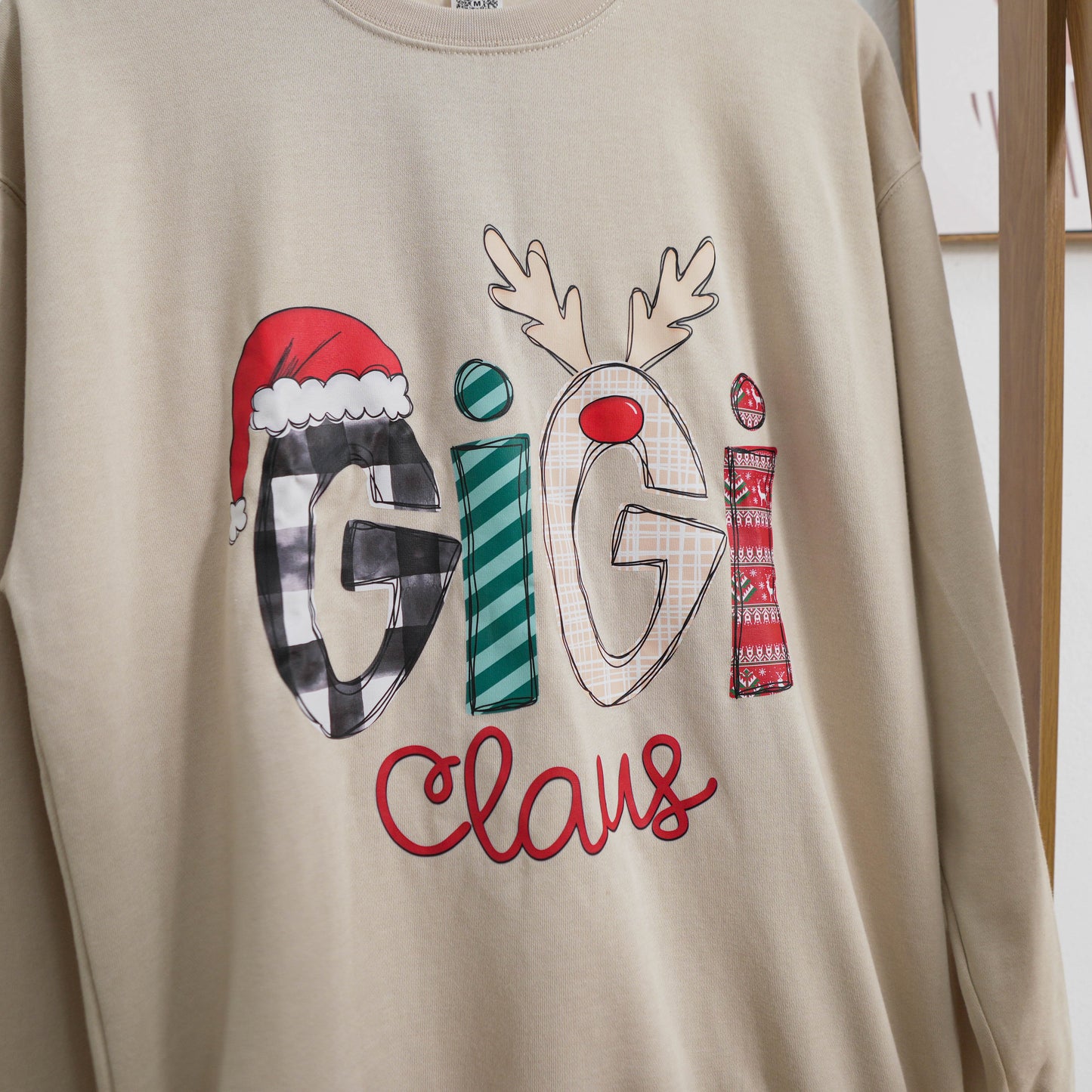 Custom Christmas Gigi Claus Sweatshirt , 2025 Christmas Nana Sweatshirt, Custom Grandma Claus Christmas Sweatshirt
