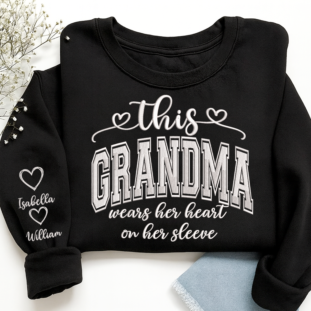 Embroidered This Grandma Wears Her Heart On Her Sleeve Shirt with Grandkids’ Names, Custom Gift for Grandma Sweatshirt