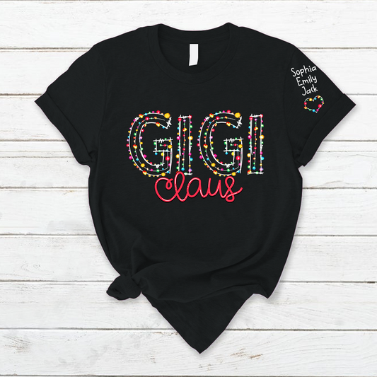 Gigi Claus Christmas lights And Grandkids Christmas Merry T-Shirt