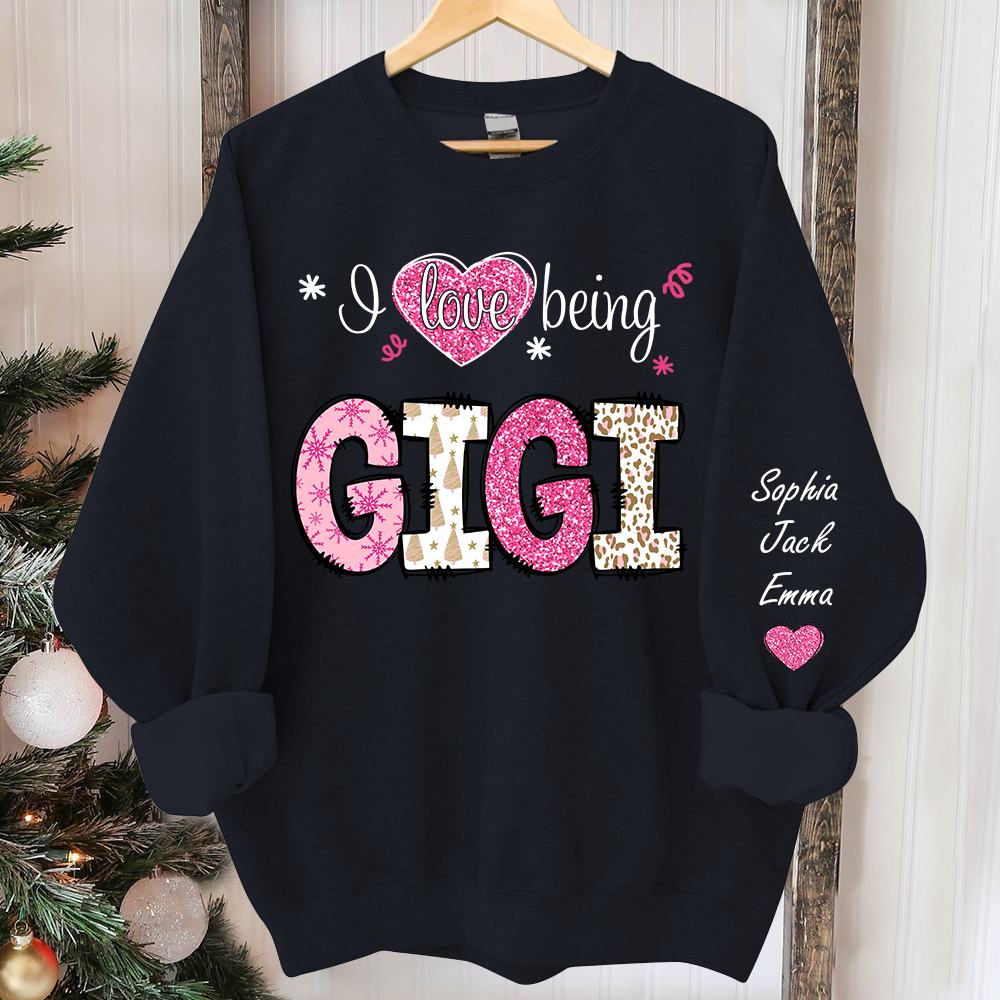 I love being Gigi Pink Christmas And Grandkids Sweatshirt