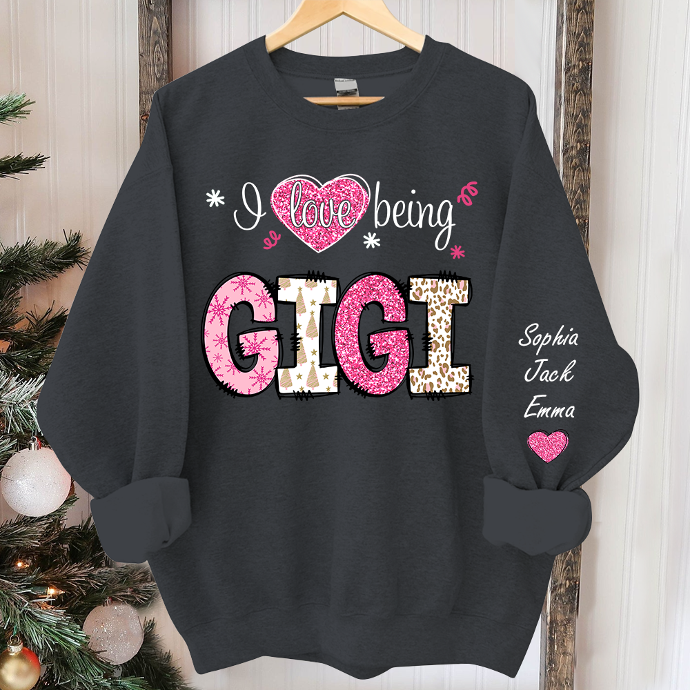I love being Gigi Pink Christmas And Grandkids Sweatshirt