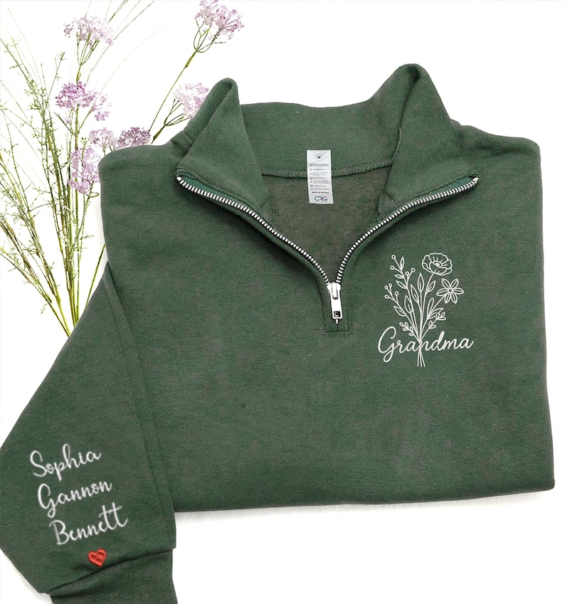 Personalized Grandma Quarter Zip Embroidered Sweatshirt – Custom Grandkids’ Names on Sleeve – Floral Embroidery Gift for Mom, Nana, Mimi
