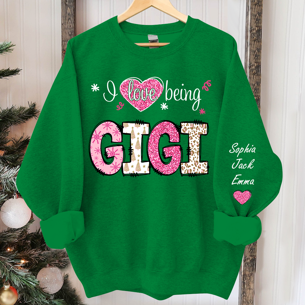 I love being Gigi Pink Christmas And Grandkids Sweatshirt